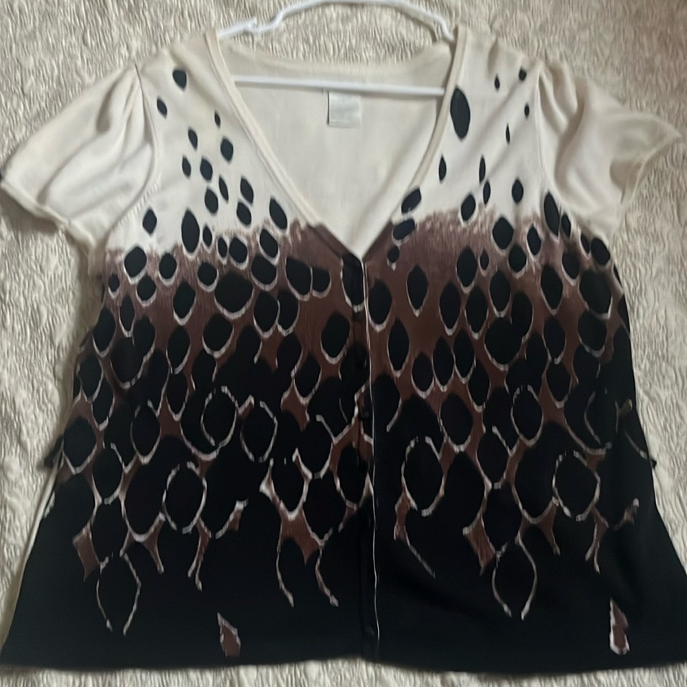 Leopard looking sweater shortly used
